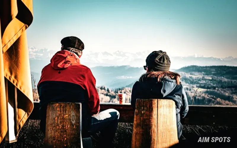 couple hiking together at sunset