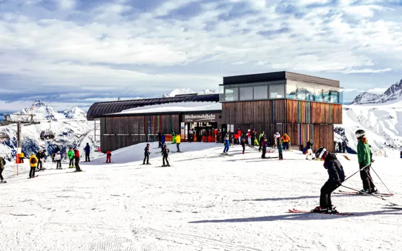 crowded ski resort lift line