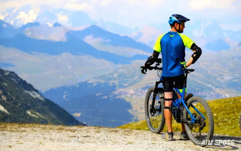 mountain biker descending a rocky trail