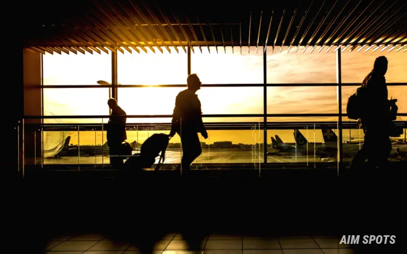 traveler walking through a modern airport terminal